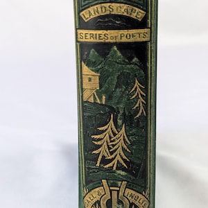 May include: A green book spine with gold embossed lettering and illustrations. The text reads ILLUSTRATED, LANDSCAPE, SERIES OF POETS, and GALL & INGLIS. The design features a mountain landscape with a building, pine trees, and a lyre emblem.