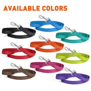 May include: Available colors for a dog leash. The leash is made of a soft, suede-like material and comes in black, blue, teal, orange, red, green, pink, brown, and purple.