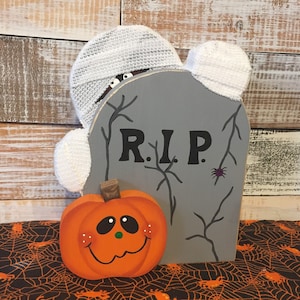 Mummy with tombstone and pumpkin. Fun Halloween decor. Handmade Halloween decor.