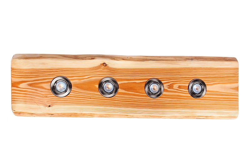 May include: A wooden light fixture with four recessed lights. The fixture is made from a natural wood slab with a rustic finish.