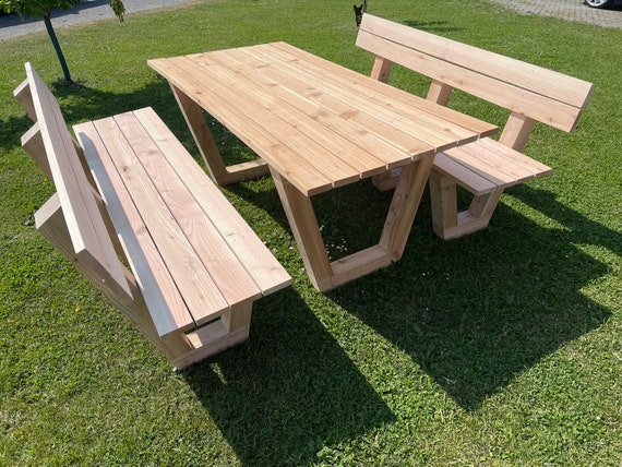 Garden furniture benches / table made of local larch wood