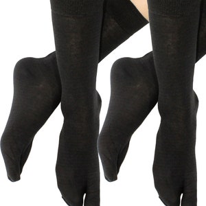 May include: Two pairs of black tabi socks with a split toe design. The socks are made of a soft, comfortable material and are perfect for wearing with traditional Japanese footwear.