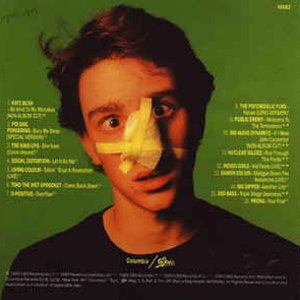 May include: The back cover of a music CD featuring a man with a bandaged nose. The album title is "The Atrocious B.O.X." and the track list is printed on the cover.