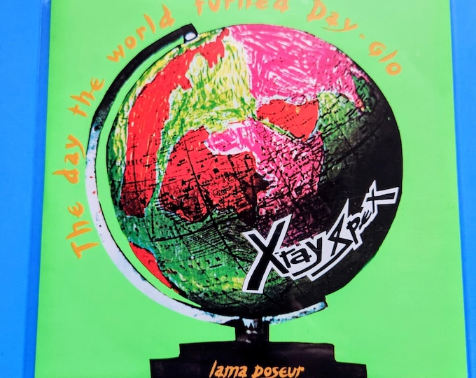 Featured listing image: X-Ray Spex "The Day The World Turned Day-Glo" Single 7" UK Import Limited Edition Orange Vinyl