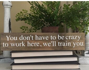 You don't have to be crazy to work here, we'll train you / Funny Sign / Office Decor / Office Gifts / Gifts For Coworkers / New Job Gift