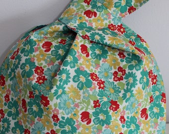 Japanese Knot Bag/Knitting bag      Small turquoise and orange flowers on a white background fabric