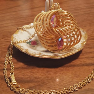 Vintage 60s goldtone pink aurora borealis rhinestone geometric pendant necklace