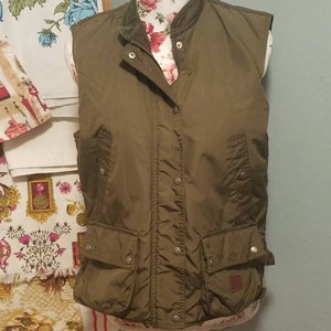 R.L denim and supply army green nylon vest wool lined  small/medium size free shipping U.S only