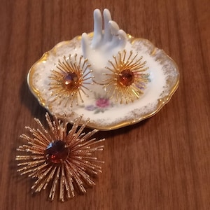 Sara Coventry atomic celestial starburst brooch and earring set amber stones