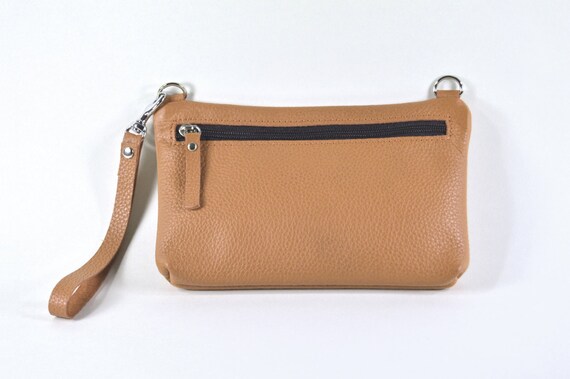 small tan clutch bag