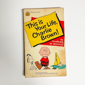 Dit is jouw leven uit de jaren 60, Charlie Brown! Paperback door Charles M. Schulz