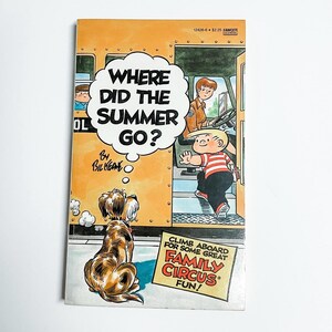 May include: A yellow school bus with a dog and a boy standing outside. The bus has the words "Where did the summer go?" written on it. The text "Climb aboard for some great Family Circus fun!" is written on a sign in front of the bus.