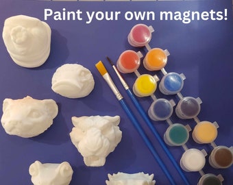 May include: A set of six unpainted white ceramic animal magnets, including a tiger, a frog, a lizard, a ferret, a bird, and a dog. The set also includes a set of paint pots with various colors, two paintbrushes, and a white background.