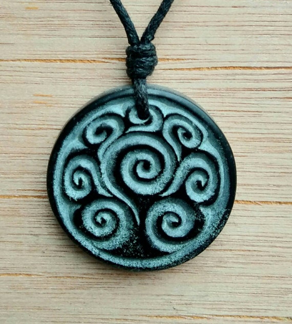 Hand carved jewelry deals