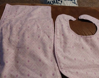 Purple bib and burp cloth set.