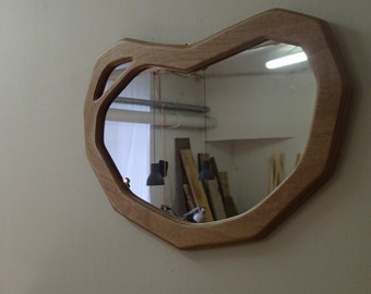 Wood frame mirror. Organic shape. Specchio in legno.
