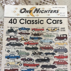 May include: A cross-stitch pattern booklet titled One Nighters 40 Classic Cars by Jeanette Crews Designs, Inc. The cover features a grid of forty small, colorful cross-stitch illustrations of vintage automobiles, each labeled with its model year and name.