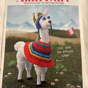 May include: A knitting pattern booklet titled Alan Dart Your Exclusive Toy Knitting Pattern featuring a white knitted llama wearing a colorful patterned hat and a vibrant rainbow-striped poncho with the text Knit your own PERUVIAN LLAMA!