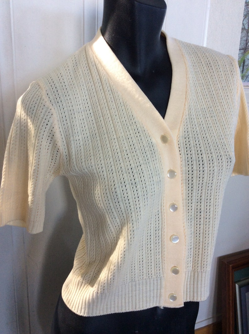 pale lemon Mc Caul short sleeve made in New Zealand 1950s 1960s Cardigan
