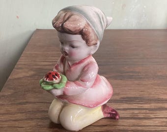 Vintage kneeling Pixie figurine with ladybug, elf or fairy with  ladybird H180