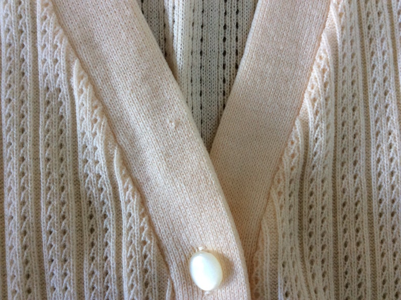 pale lemon Mc Caul short sleeve made in New Zealand 1950s 1960s Cardigan