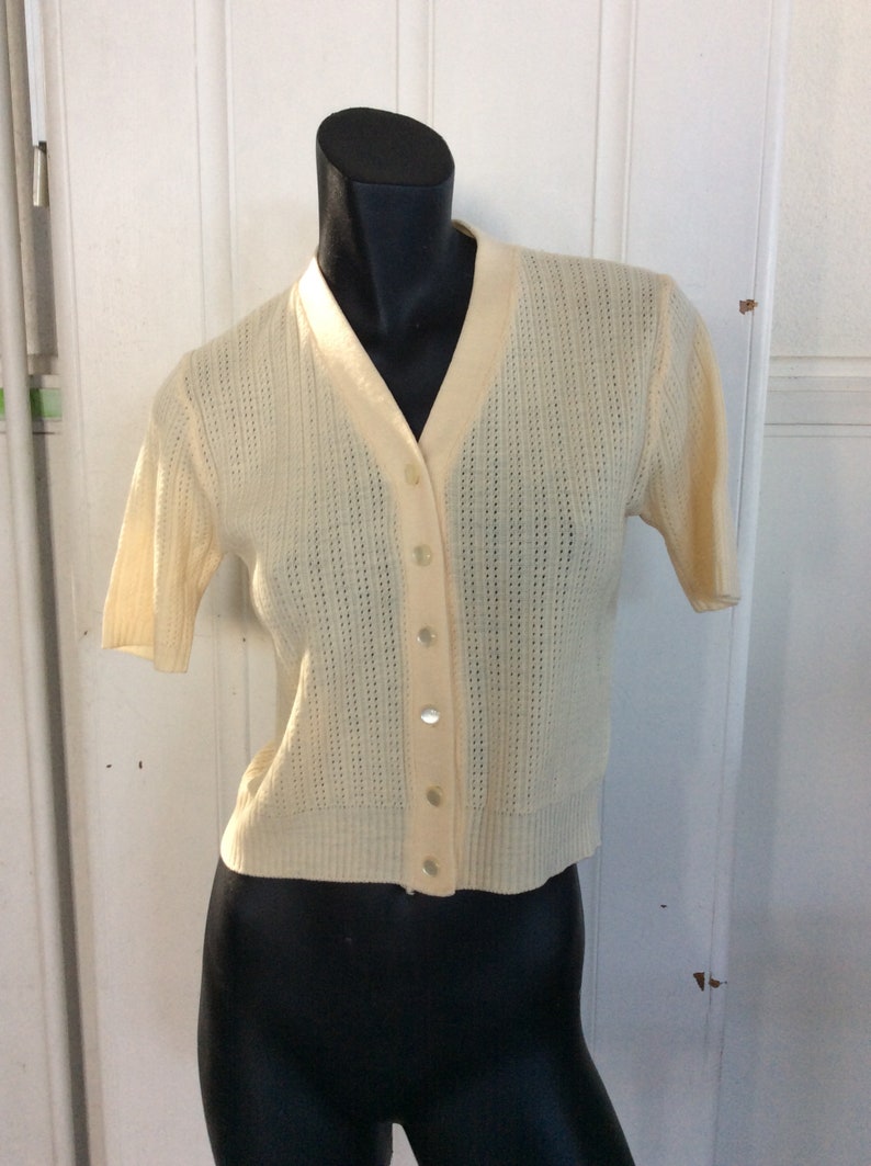 pale lemon Mc Caul short sleeve made in New Zealand 1950s 1960s Cardigan