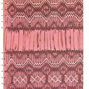 May include: A close-up of a pink fabric with a white and pink stitch pattern. The fabric is gathered in rows, creating a ruffled effect.