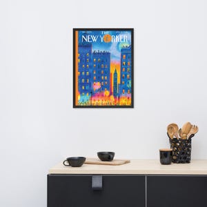 Puede incluir: Una impresi&oacute;n enmarcada de la portada de la revista The New Yorker del 22 de junio de 2020, que presenta una colorida ilustraci&oacute;n de edificios urbanos al atardecer con un icono de baloncesto reemplazando la letra O en el t&iacute;tulo.