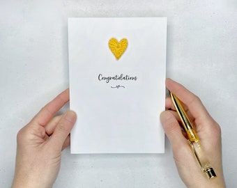 Congratulations card finished with a crochet heart