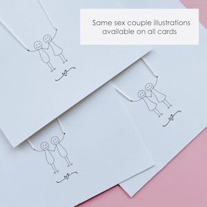 May include: White greeting cards with black line drawings of same-sex couples holding hands, with a heart symbol below. The text "Same sex couple illustrations available on all cards" is displayed on a white rectangle.