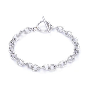 May include: A silver chain bracelet with a toggle clasp.