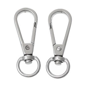 May include: Two silver-colored swivel snap hooks. Each hook has a spring-loaded clasp and a circular ring at the base. The hooks are designed for attaching to keychains, bags, or other items.