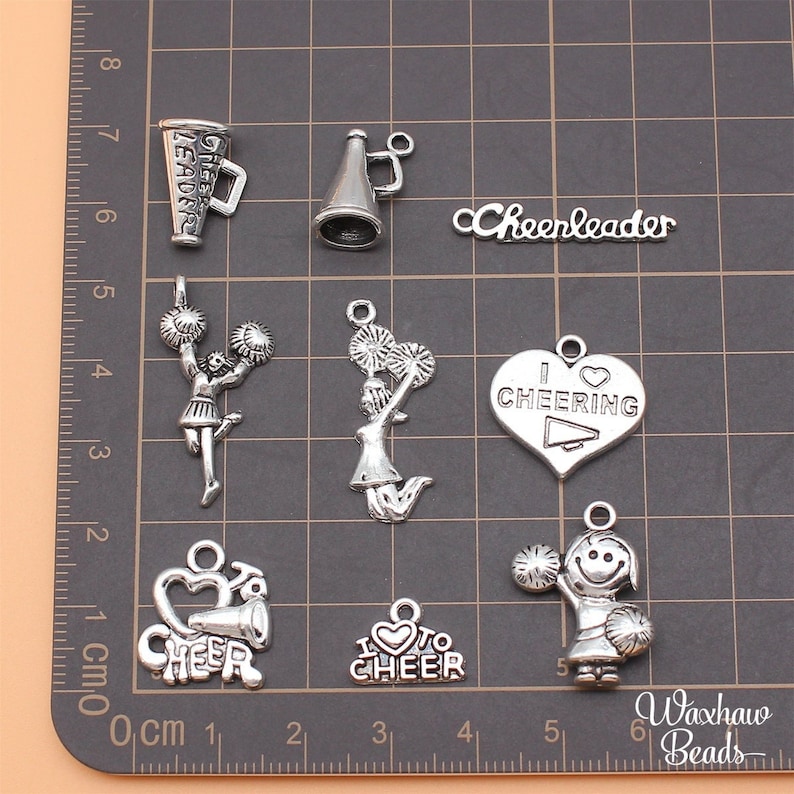BULK 9 Silver Cheerleading Charms Cheerleader Charms Mixed Lot Of bulk-9-silver-cheerleading-charms-cheerleader-charms-mixed-lot-of