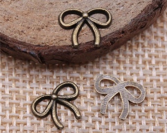 15 Tiny Bronze Bow Charms, 11x9mm, Antique Bronze Tone (B-72)