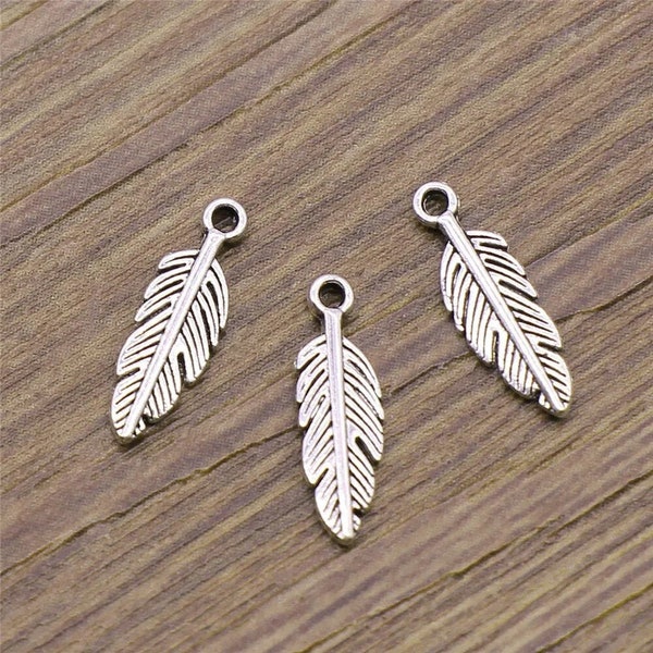 15 Silver Small Feather Charms, 15x5mm, Silver Tone Charms (F-233)