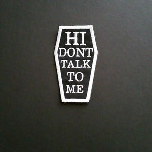 Hi, don&#39;t talk to me patch. Feeling antisocial? Rather be dead than talk? I get ya!! Let everyone know by wearing this coffin shaped patch.