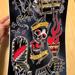 May include: Tattoo art print in black and white, depicting a bat, treasure chest, skull, tomb, and a torch. The skull has a banner that says "Roll High, Don't Die". The art is in a traditional tattoo style.
