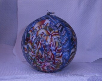 Vela de bola de milenrama envolvente