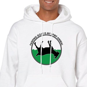 May include: White hooded sweatshirt with a black and green circle graphic. The graphic features a black silhouette of a goat lying on its back with the text "Fainting Goat is my Spirit Animal".