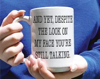 15 oz. And Still Talking Coffee Mug / Office humor / Despite the look on my face / Talks a lot / Novelty