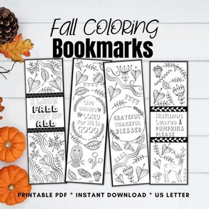 May include: Four black and white printable bookmarks with fall themes. The bookmarks feature illustrations of leaves, owls, deer, and pumpkins. The text on the bookmarks includes "I love fall most of all", "Give thanks to the Lord for He is good", "Grateful thankful blessed", and "Autumn leaves & pumpkins please".