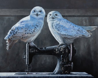 May include: An oil painting depicts two snowy owls perched on a vintage black sewing machine. The owls have white feathers with dark spots and yellow eyes. The background is a dark, muted gray.