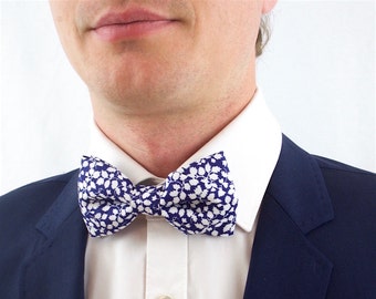 Bow tie in Liberty Glenjade marine, pre-noue, and adjustable, white and blue foliage