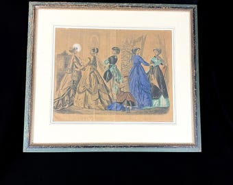 May include: Framed antique print depicting five women in period dresses. The print features a muted color palette with shades of beige, blue, and green. The frame is a distressed blue-green color, adding to the vintage aesthetic. The print is a historical fashion illustration.