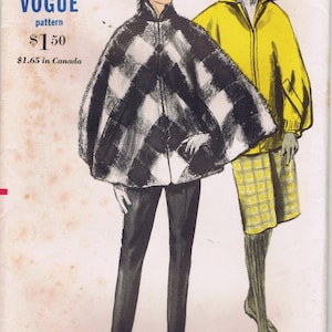 May include: A vintage sewing pattern for a black and white checkered cape with a hood. The pattern is from Vogue and is size 14, 34, 36. The pattern is $1.50 and $1.65 in Canada.