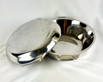 Plat à four Nambe vintage avec couvercle, format 4 tasses, idéal pour un usage à table.