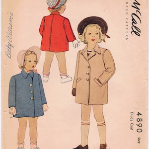 May include: Vintage McCall's sewing pattern for a child's coat, size 4. The illustration shows three children wearing different coat styles in red, blue, and tan. The pattern includes the text "Child's Coat" and "Printed Pattern".