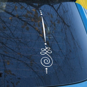 May include: A blue car with a white vinyl decal on the back window. The decal features a stylized design with a spiral and dots. The text "high quality vinyl decal threefold art + design + print FREE SHIPPING" is on a yellow background.