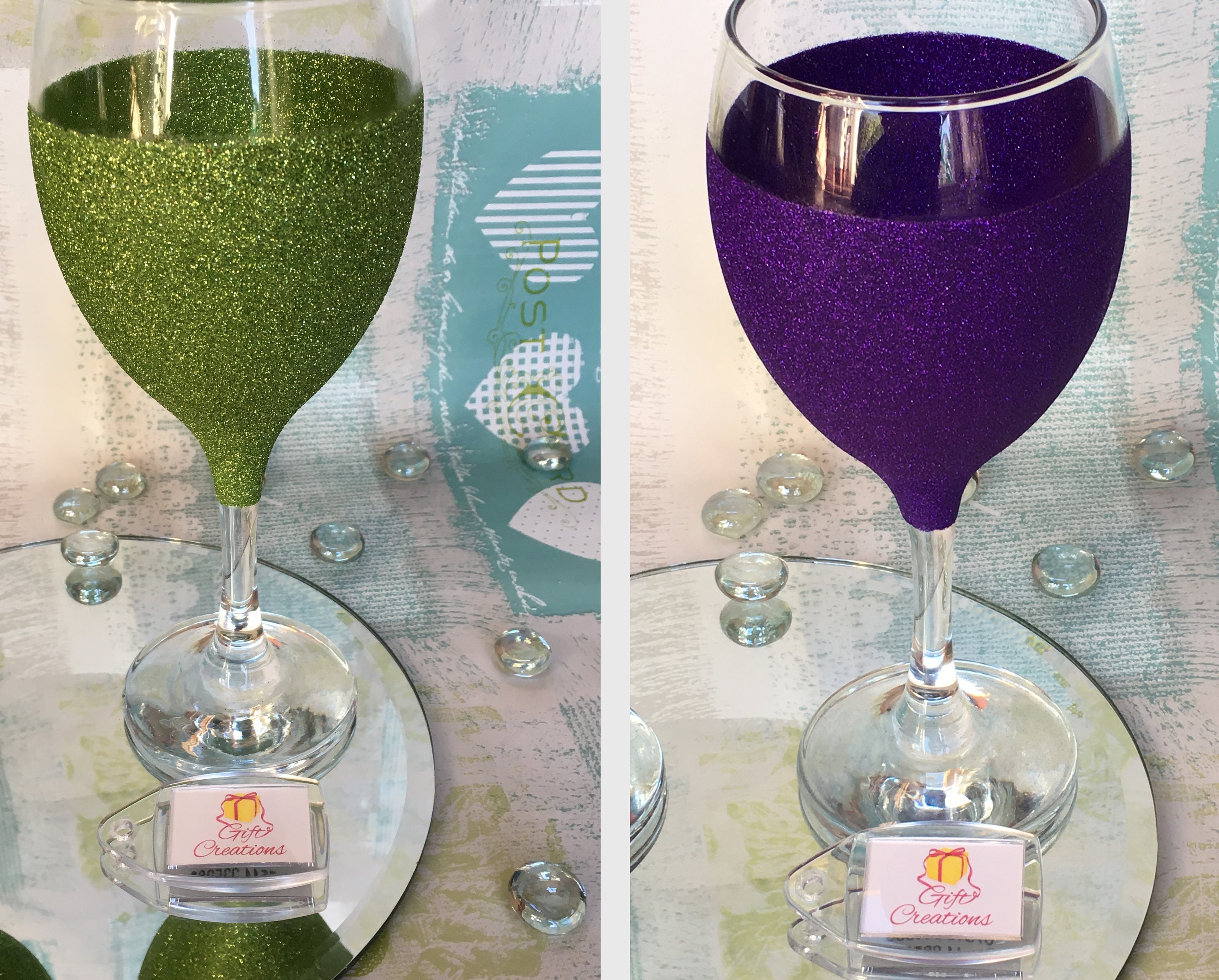 sold individually Green and dark purple stemless wine glasses