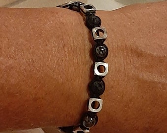 Men or women  bracelet with lava ,  hematite beads and nicked bronze charms handmade
